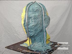 לחיצה להגדלת תמונה מטביעים במעיל התמיכה צינורות פלסטיק שישמשו כמקומות אחיזה ויקלו על שינוע התבנית.